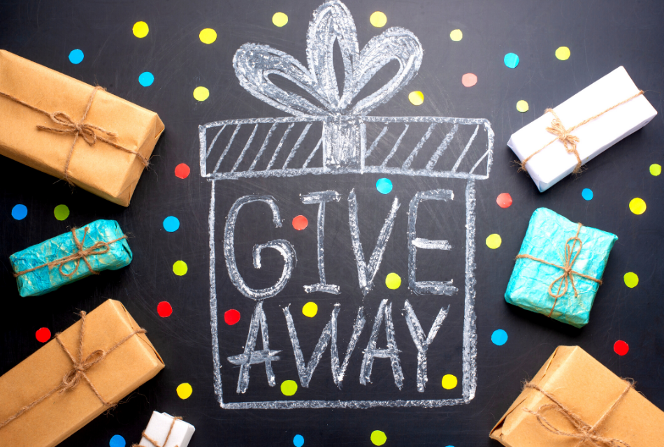 chalkboard with a drawn present and give away phrase